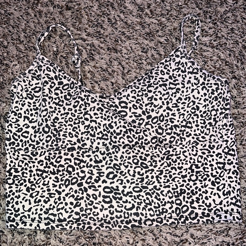 worn once cute leopard cross top